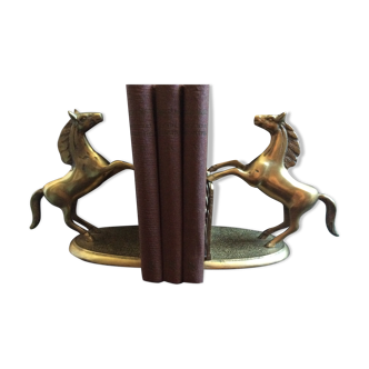 Greenhouse brass books horses