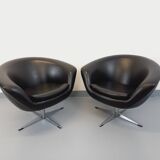 Pair of vintage Scandinavian swivel armchairs in faux leather and chrome.
