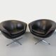 Pair of vintage Scandinavian swivel armchairs in faux leather and chrome.