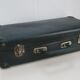 Vintage green cardboard suitcase