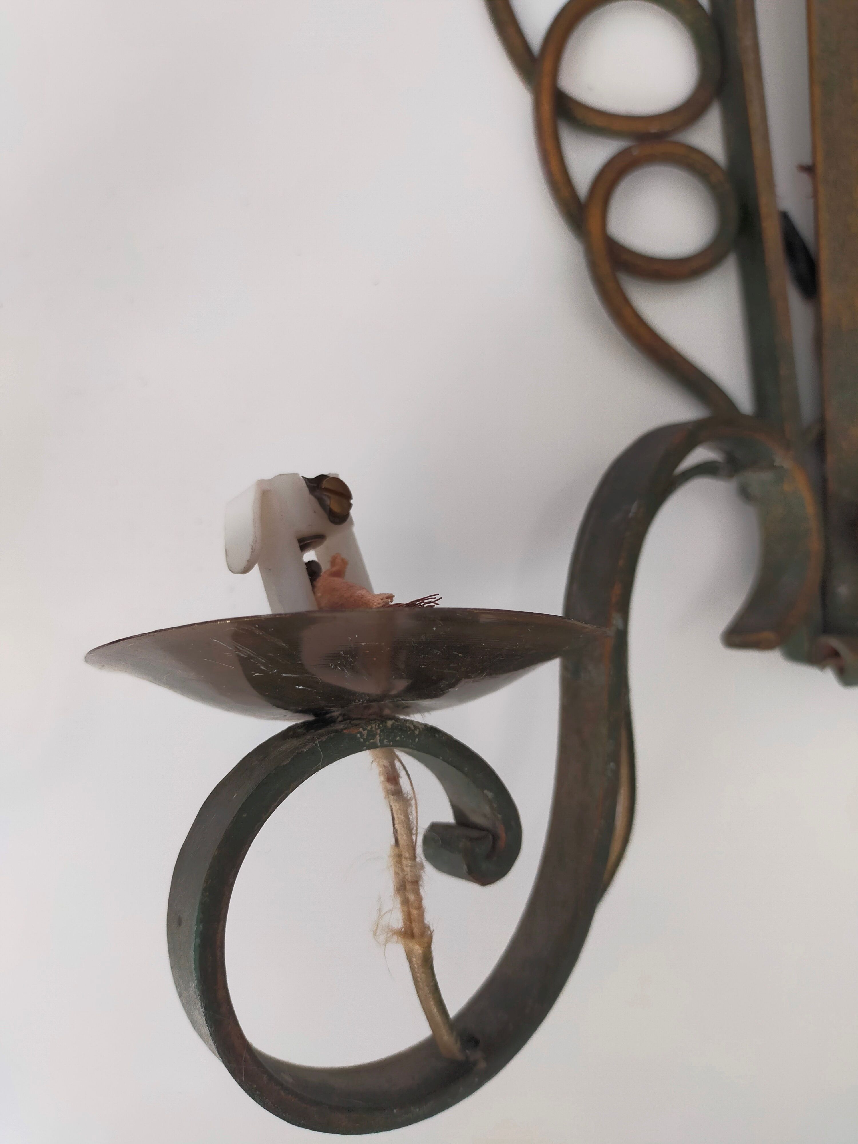 Pairs of vintage wrought iron wall lamps