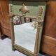 Empire style mirror in wood and gilding