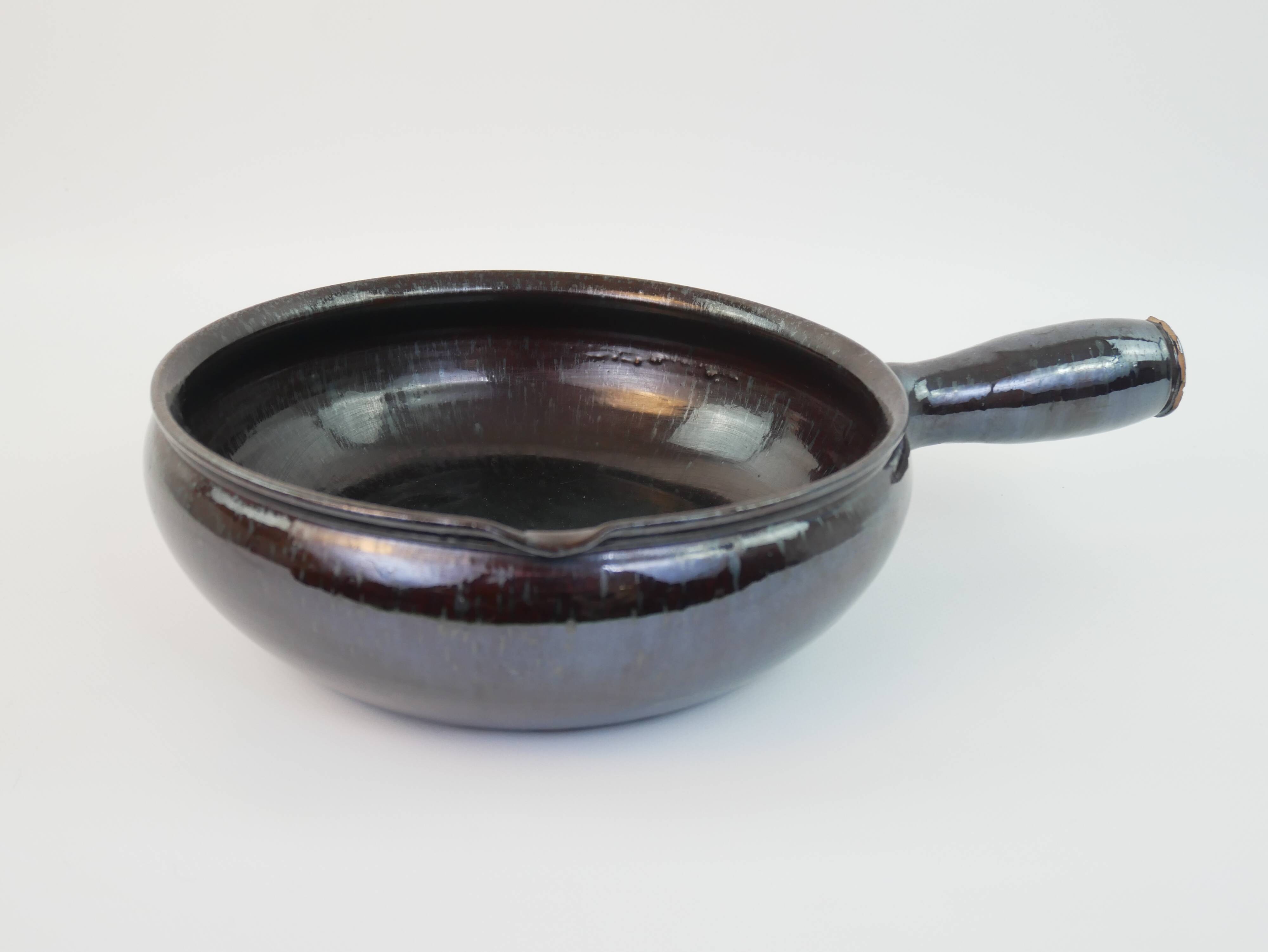 Ebony enameled ceramic fondue pot signed André Martin Vallauris 1950s