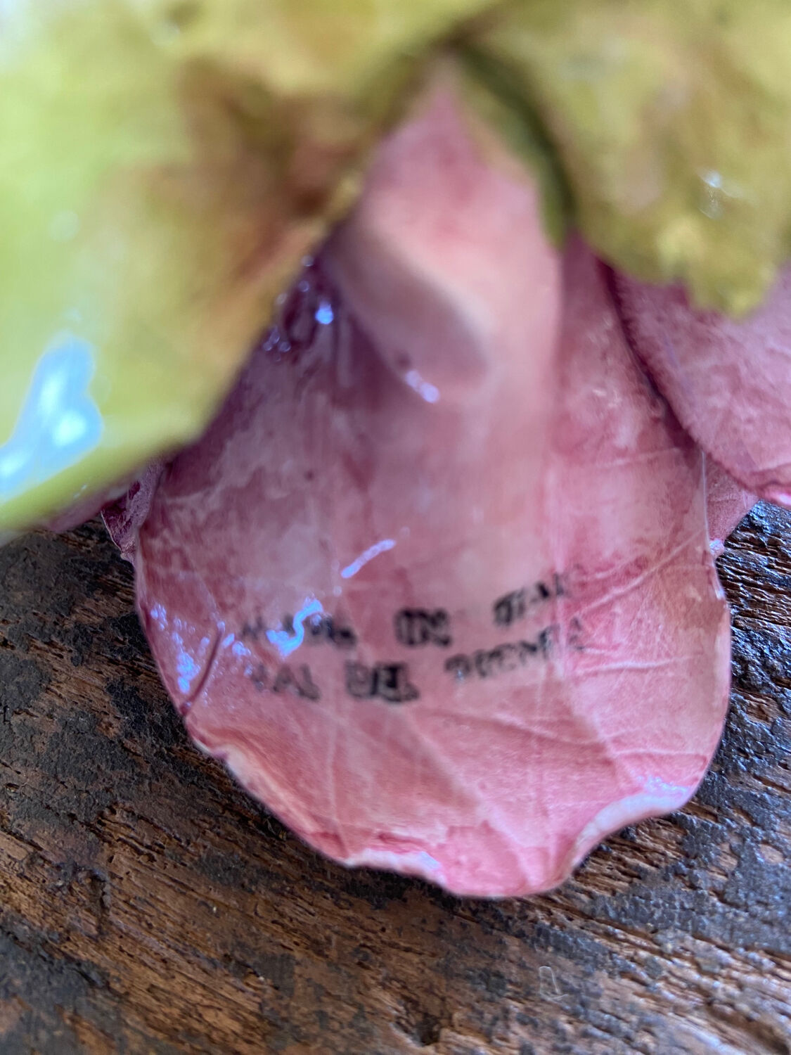 Rose-shaped earthenware candle holder