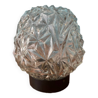 Wall light in thick bubbled chiseled glass