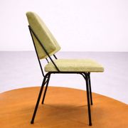 Vintage 1950s chair in black metal and almond green fabric.