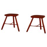 Pair of patinated wooden stools painted red with flared legs, 1950s-1960s.