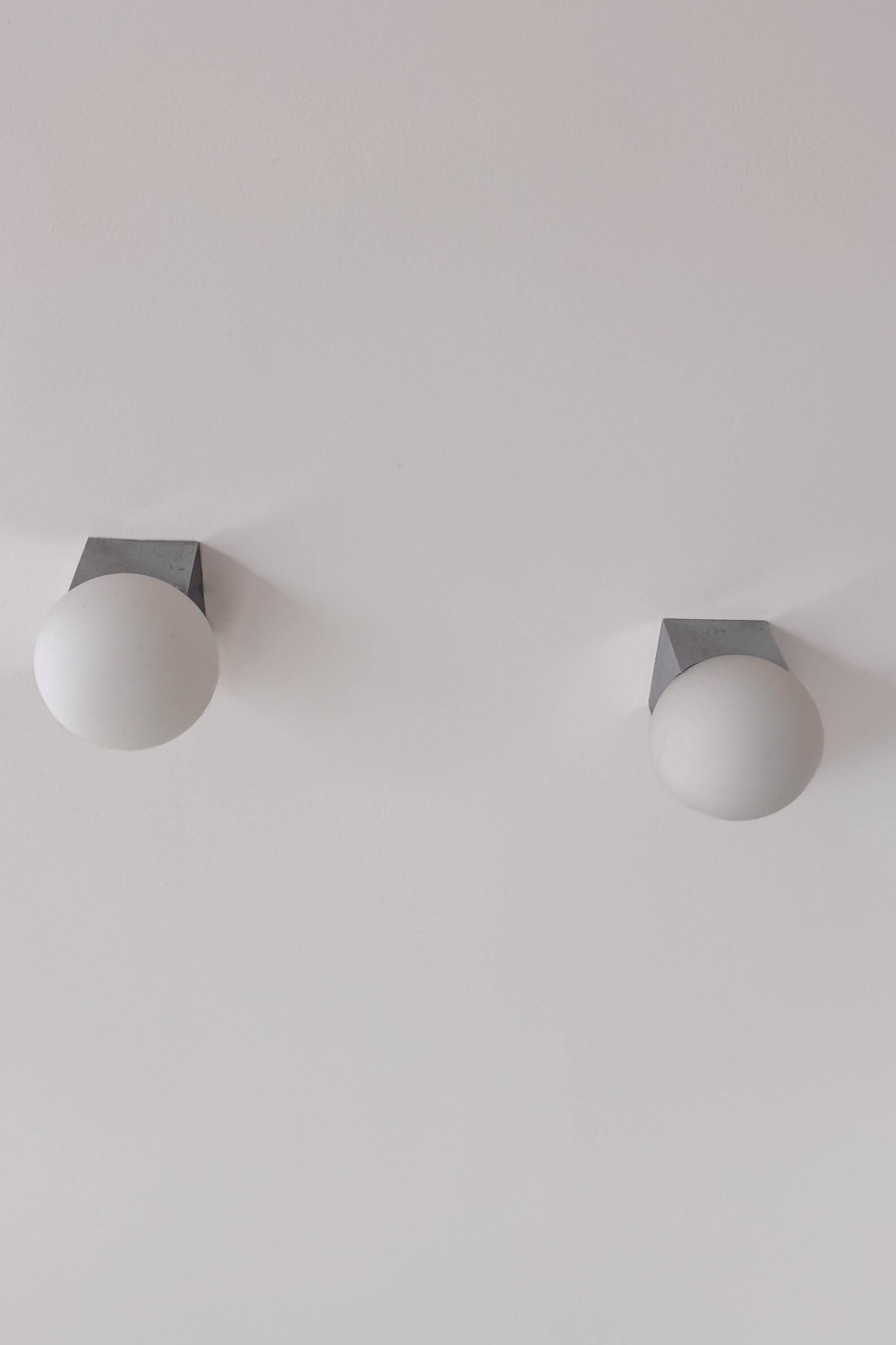 Pair of vintage wall lights in chrome and opaline, France 1990