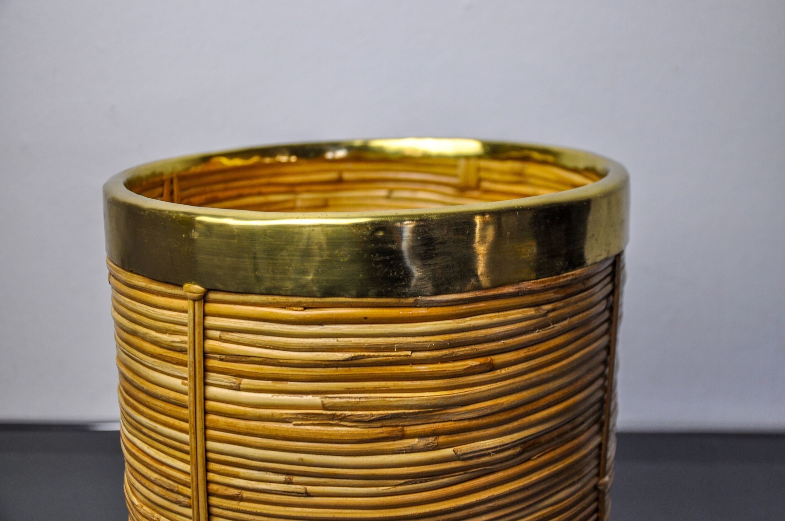 Rattan and brass book basket, Italy, 1970