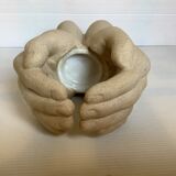 Hand-shaped candle holder