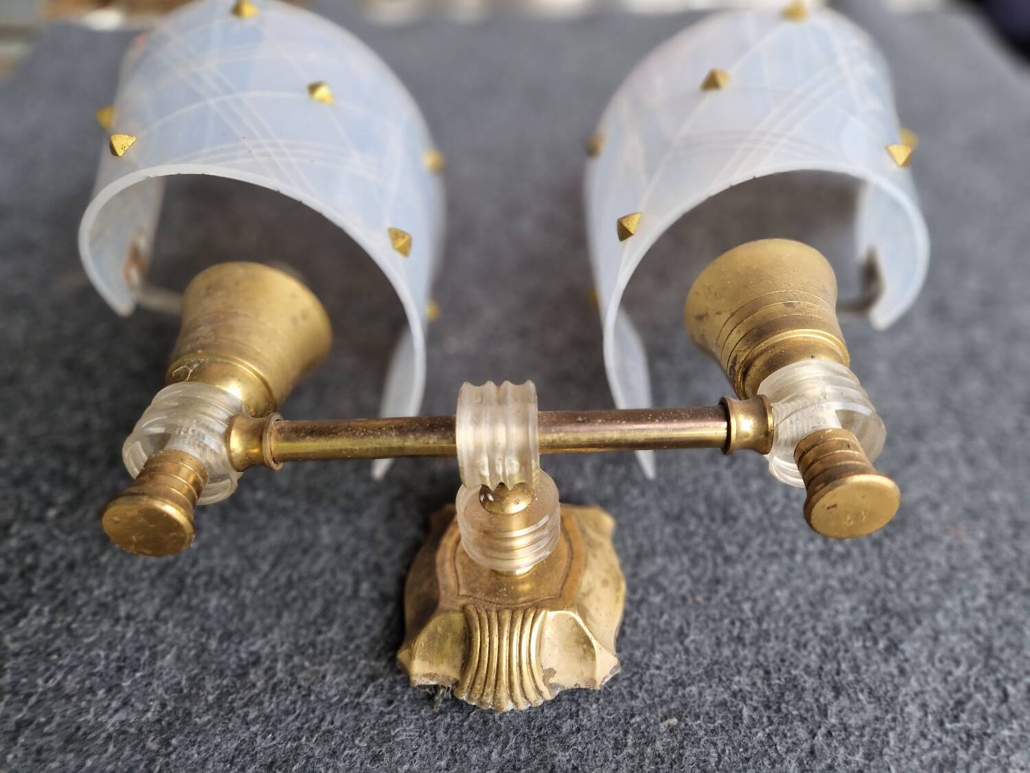 Pair of plastic and brass wall lights from the 60s/70s