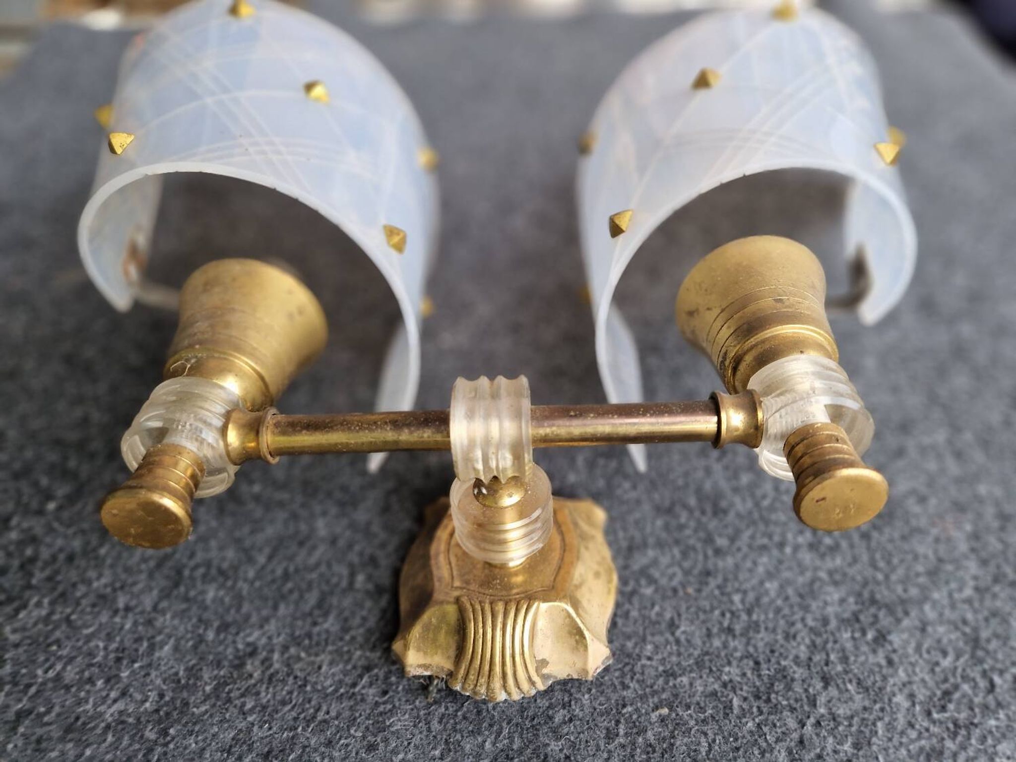 Pair of plastic and brass wall lights from the 60s/70s.