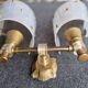 Pair of plastic and brass wall lights from the 60s/70s.