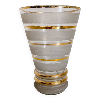 White granite vase with gold edging.