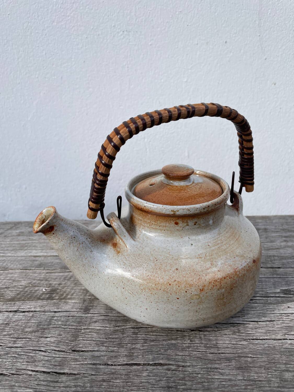 Grand Feu ceramic stoneware and rattan teapot