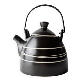 Vintage ceramic teapot from the 1980s, black with white stripes and a metal handle.