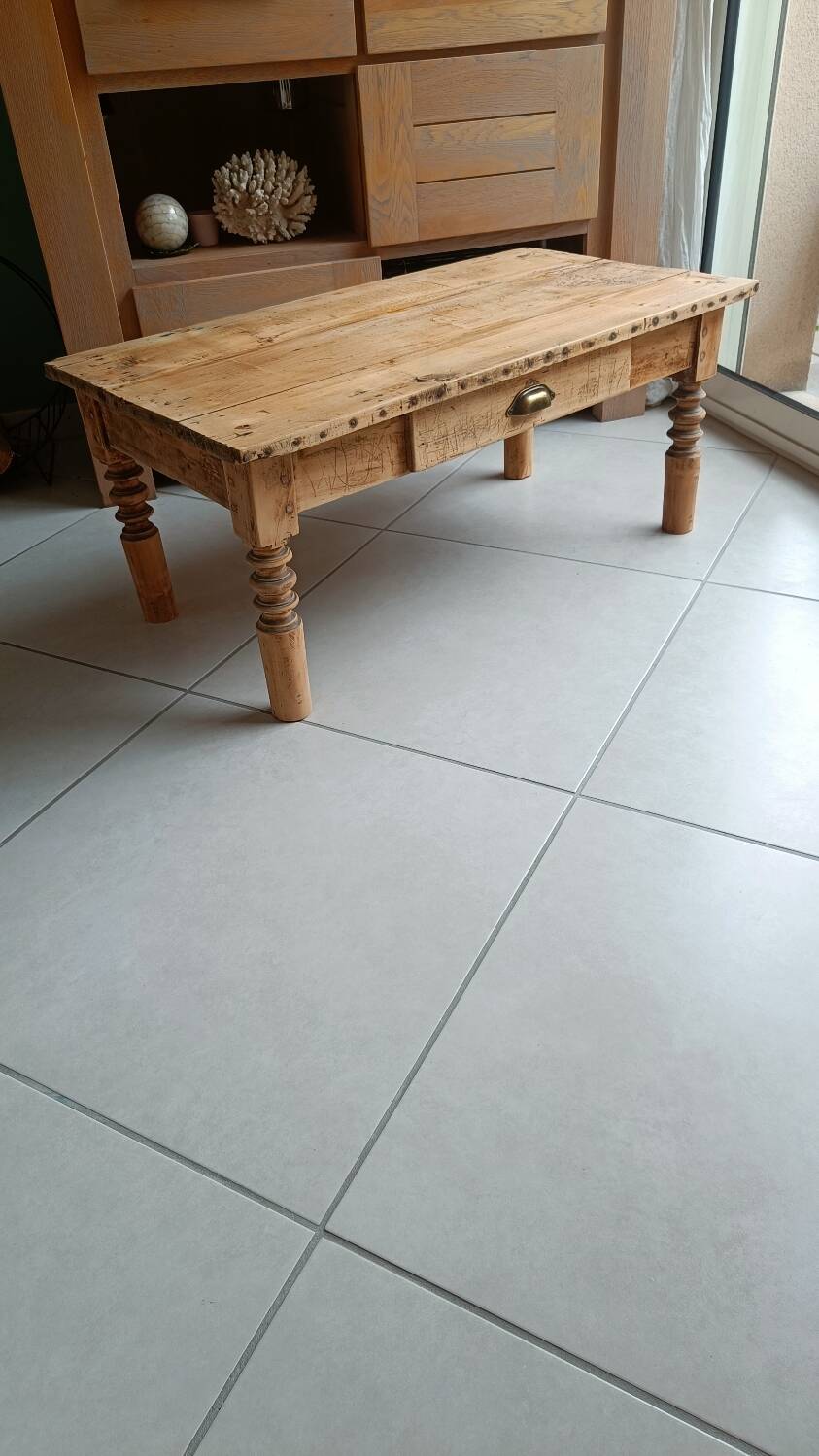 Raw wood coffee table in a country style