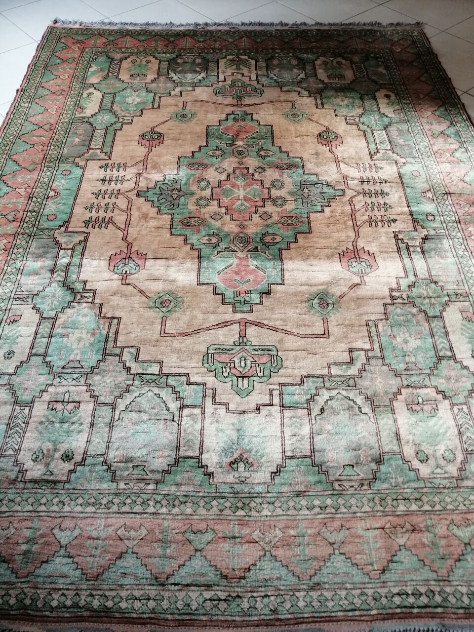 Afghan rug in pastel colors