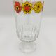 Vintage stemmed glass with floral decoration