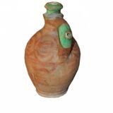 Antique red and green terracotta carafe, rustic Hungarian jug from the 1920s.