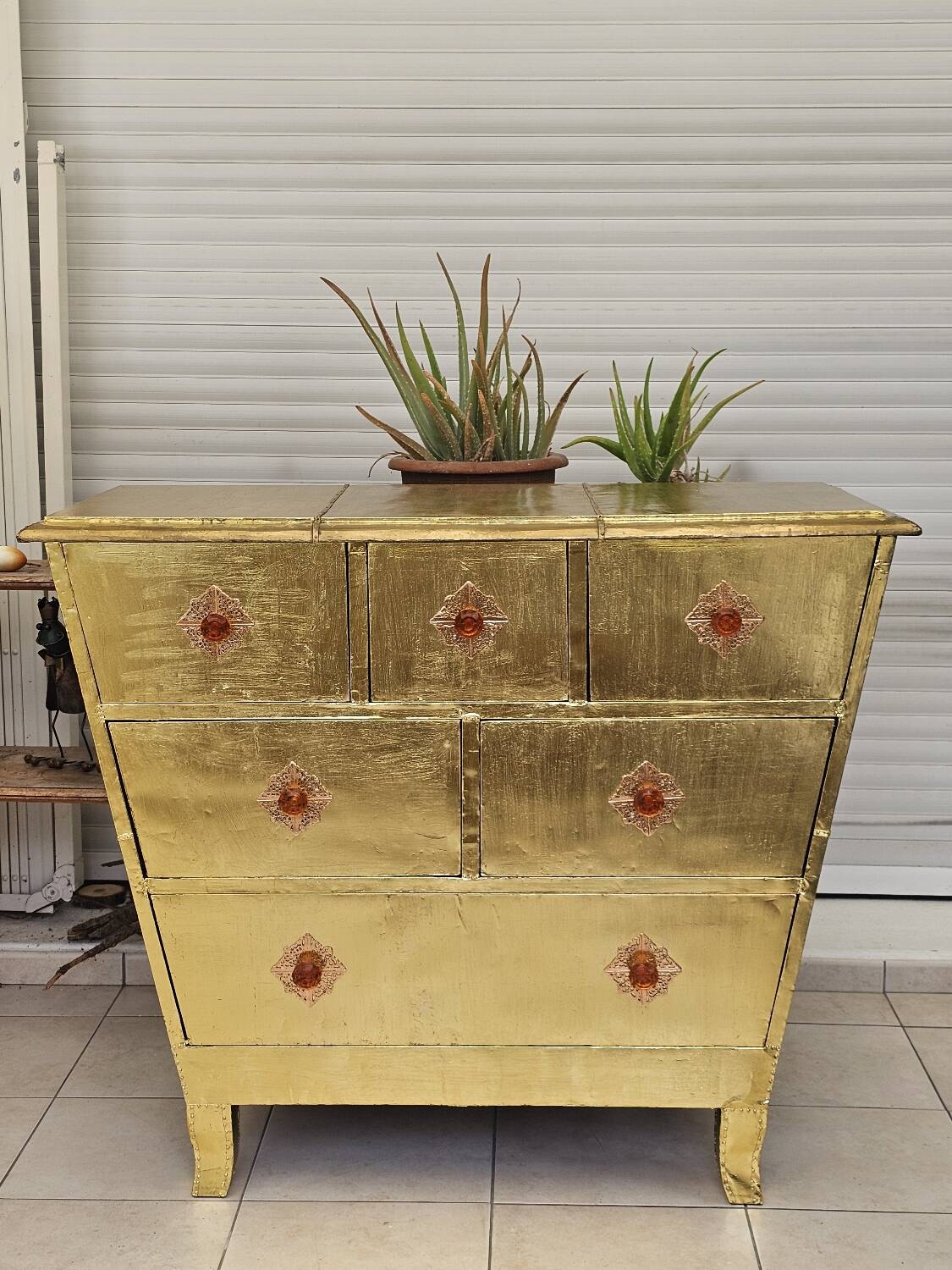 Handcrafted commode fully dressed in brass, original piece and