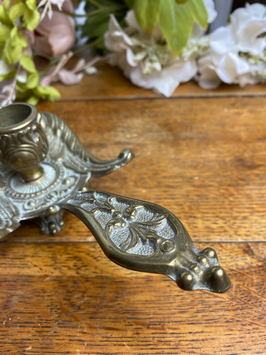 Hand candlestick, peacock shape, in bronze
