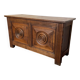 Small antique oak chest with carved panels.