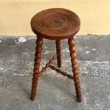 High tripod stool.