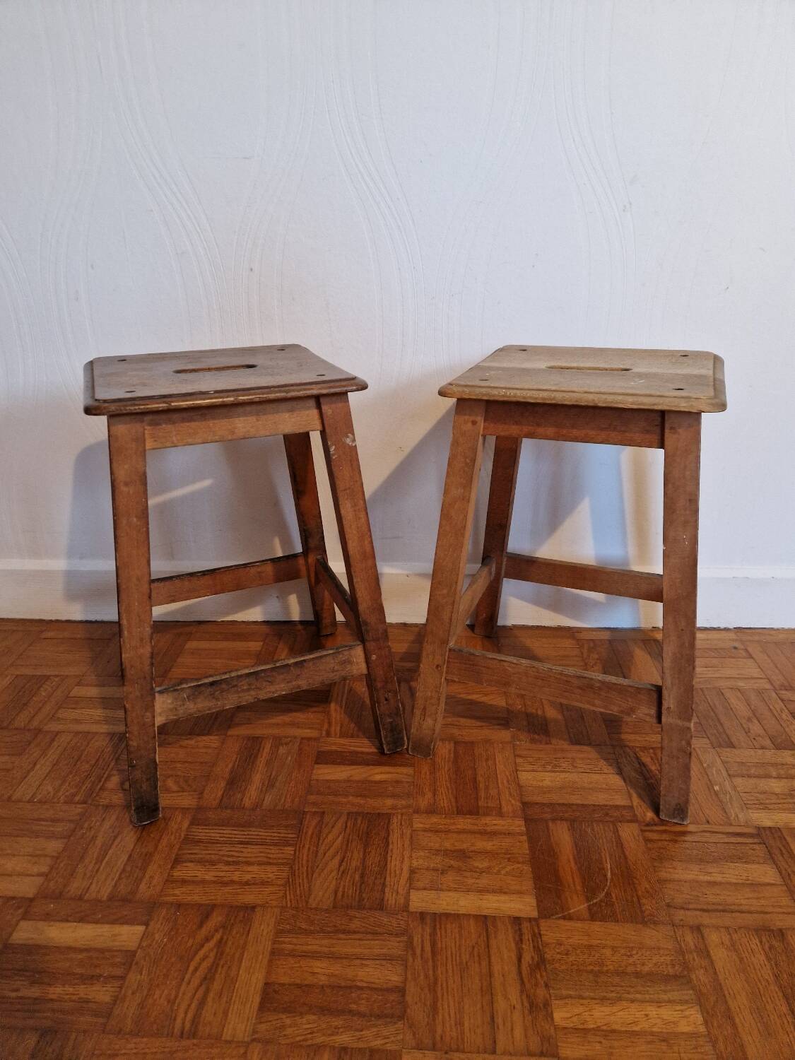 Pair of antique wooden workshop stools