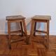 Pair of antique wooden workshop stools
