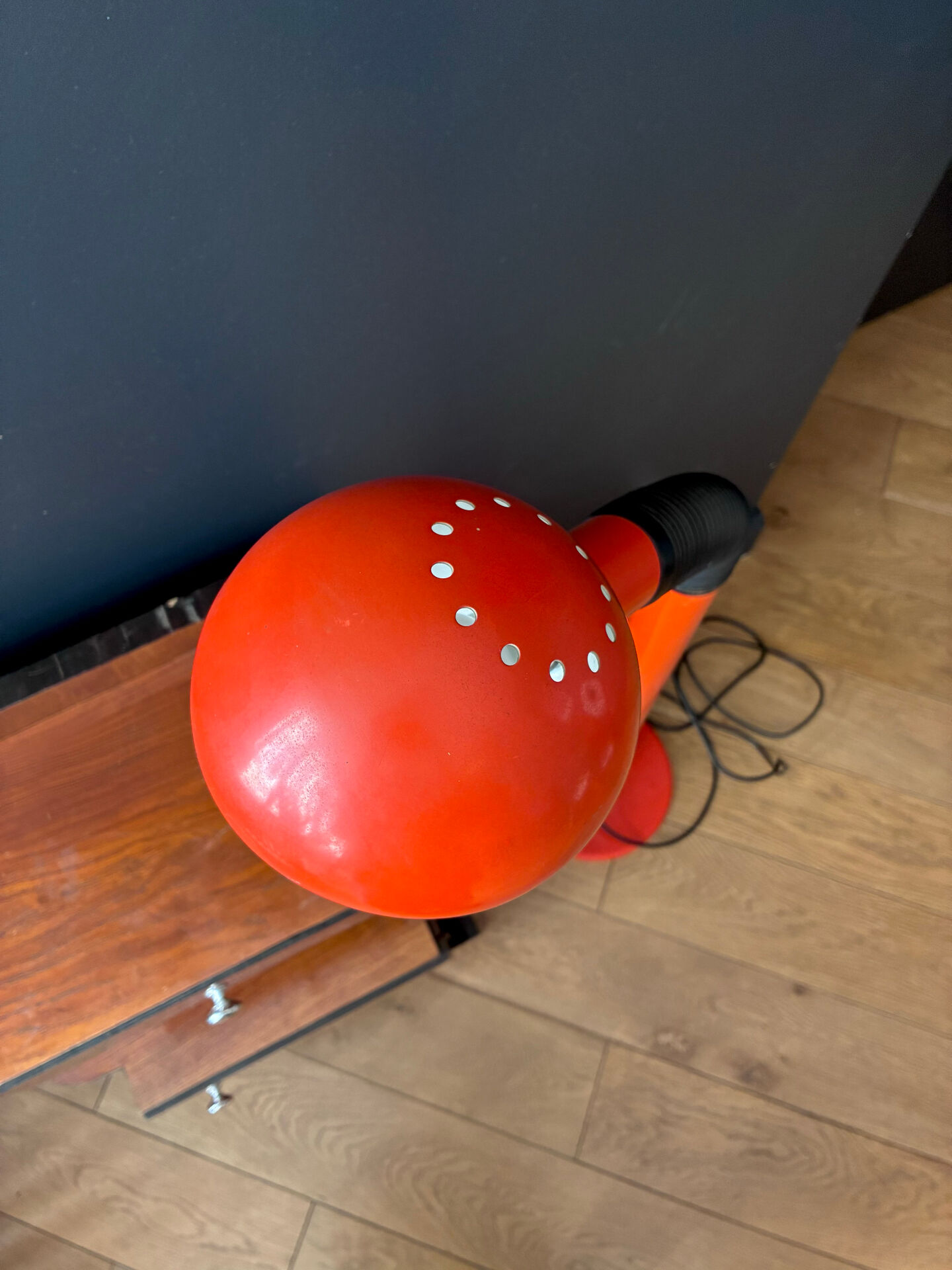 1970s orange lacquered metal floor lamp.