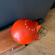 1970s orange lacquered metal floor lamp.