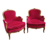 Pairs of Louis XV shepherdess chairs in red velvet.