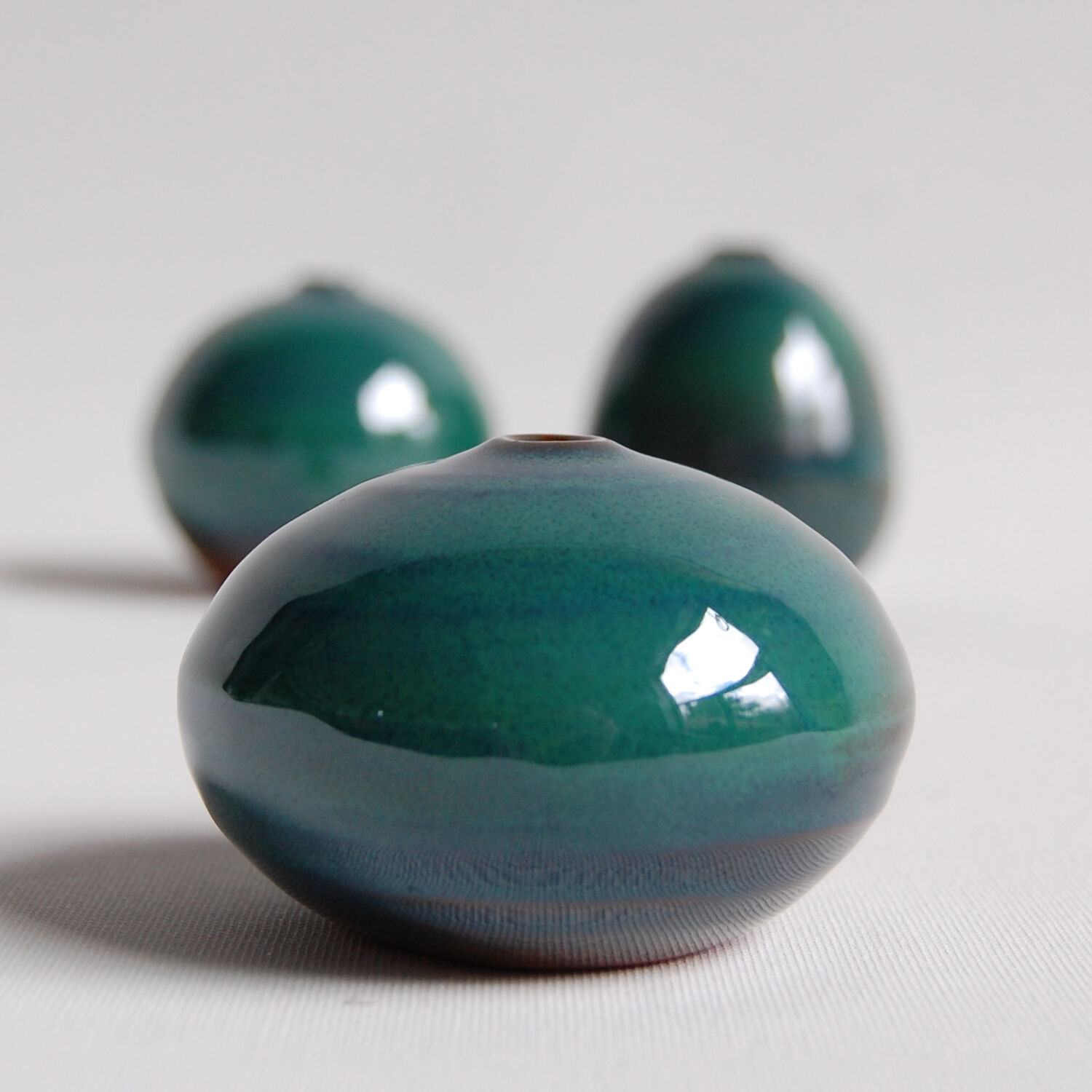 Suite of 3 green ceramics by Antonio Lampecco