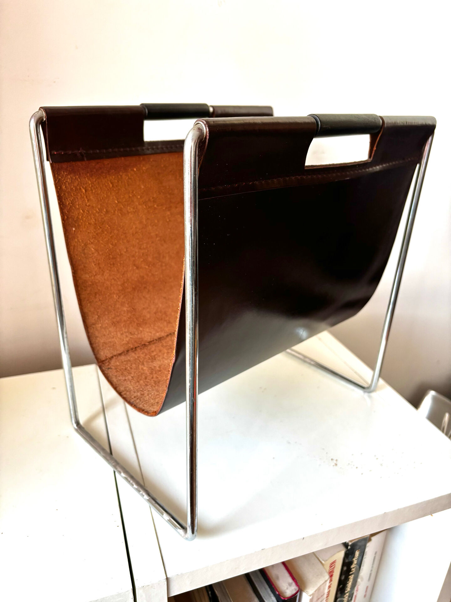 Leather and chrome magazine rack Brabantia