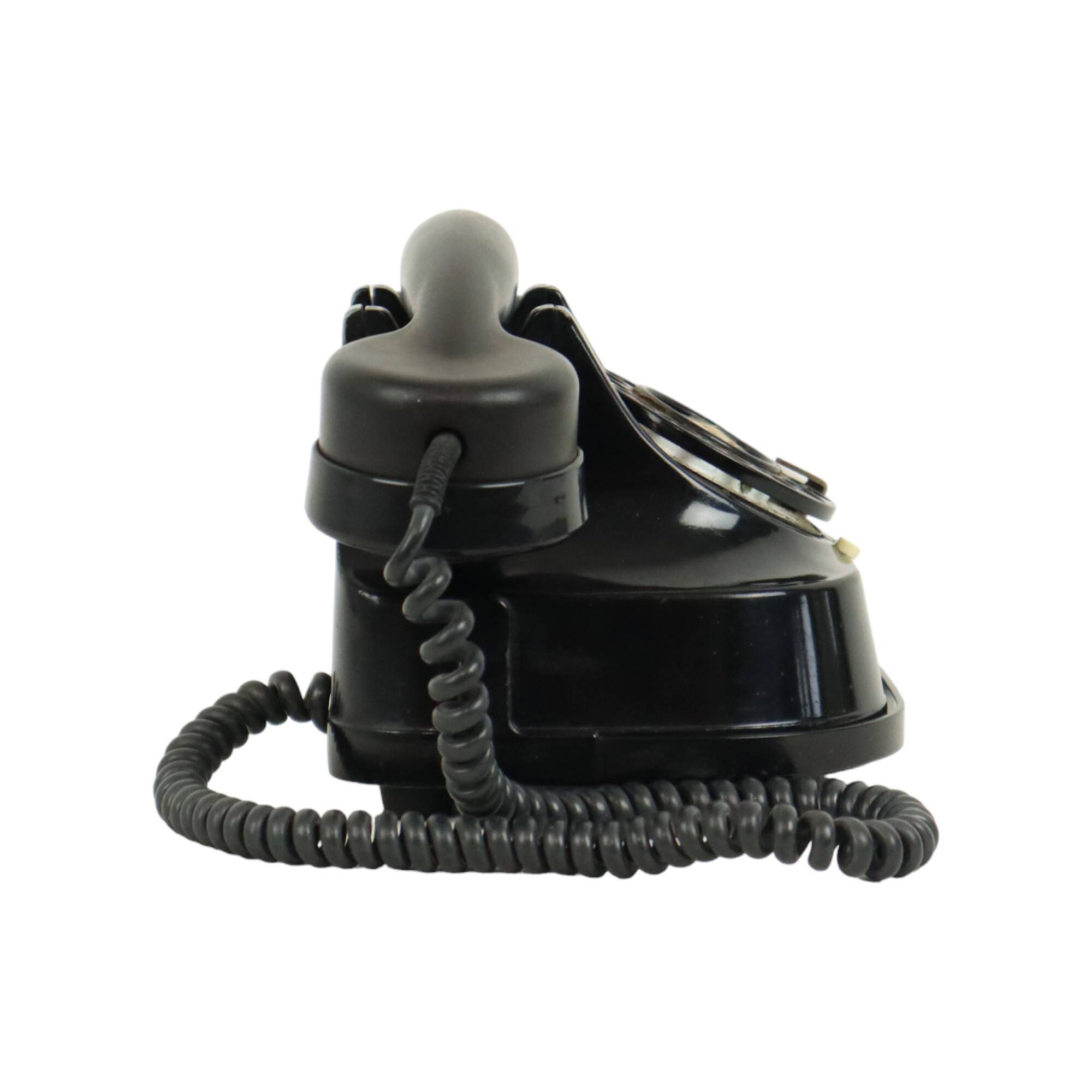 Old black telephone with rotary dial metal Bakelite RTT 56B