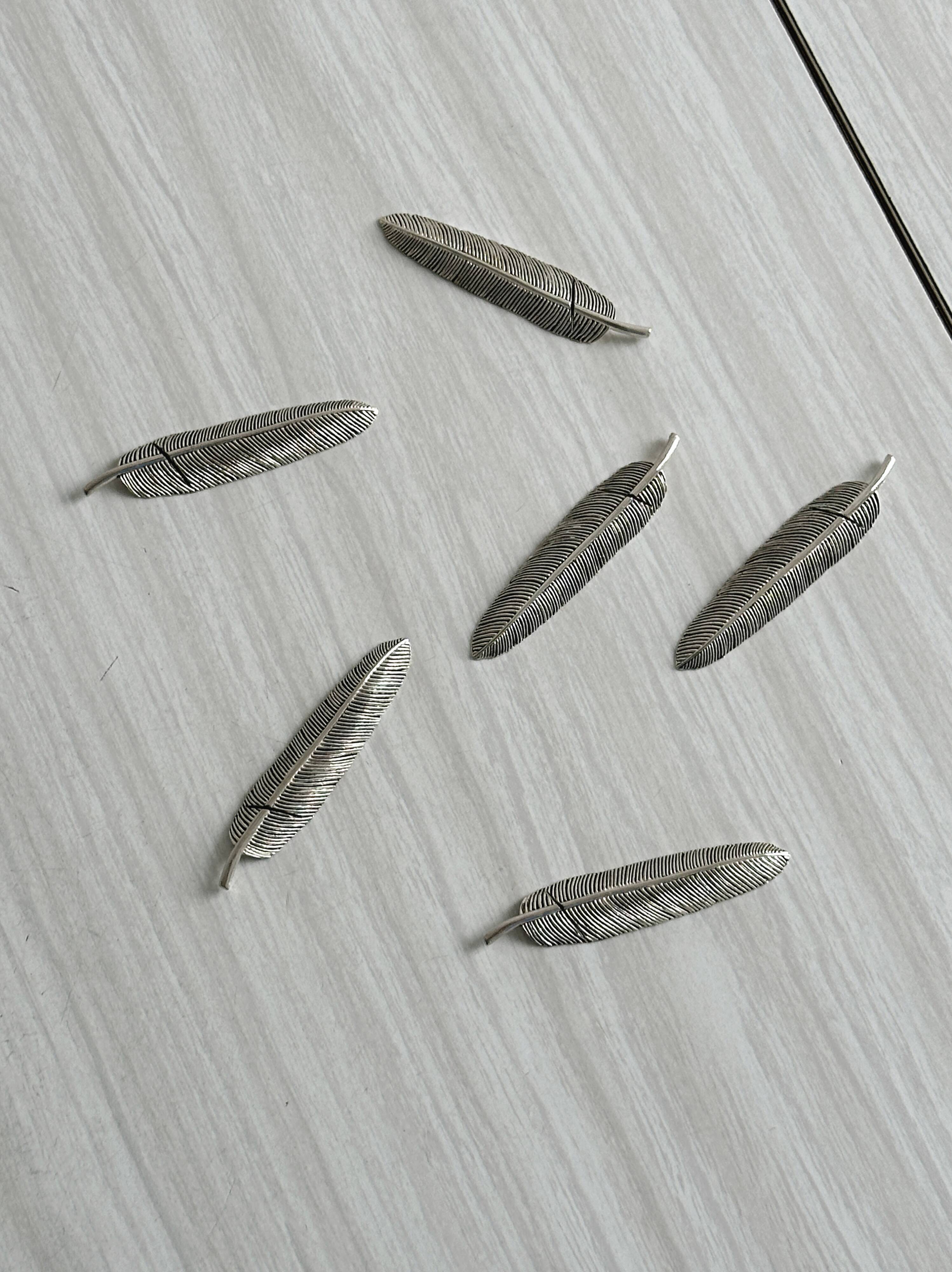 Set of 6 metal knife rests, name holders.