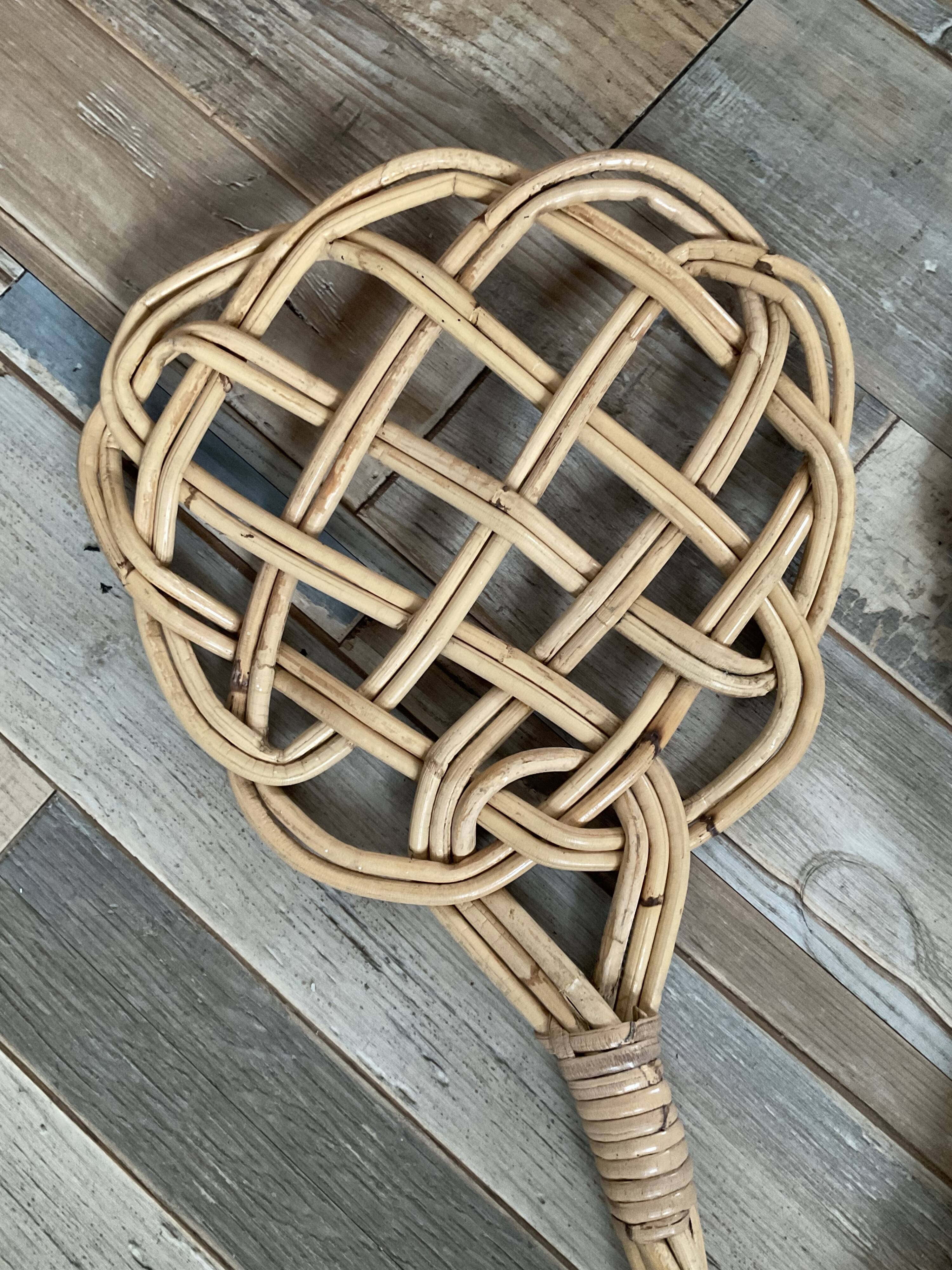 Duo of vintage rattan carpet beaters from the 70s