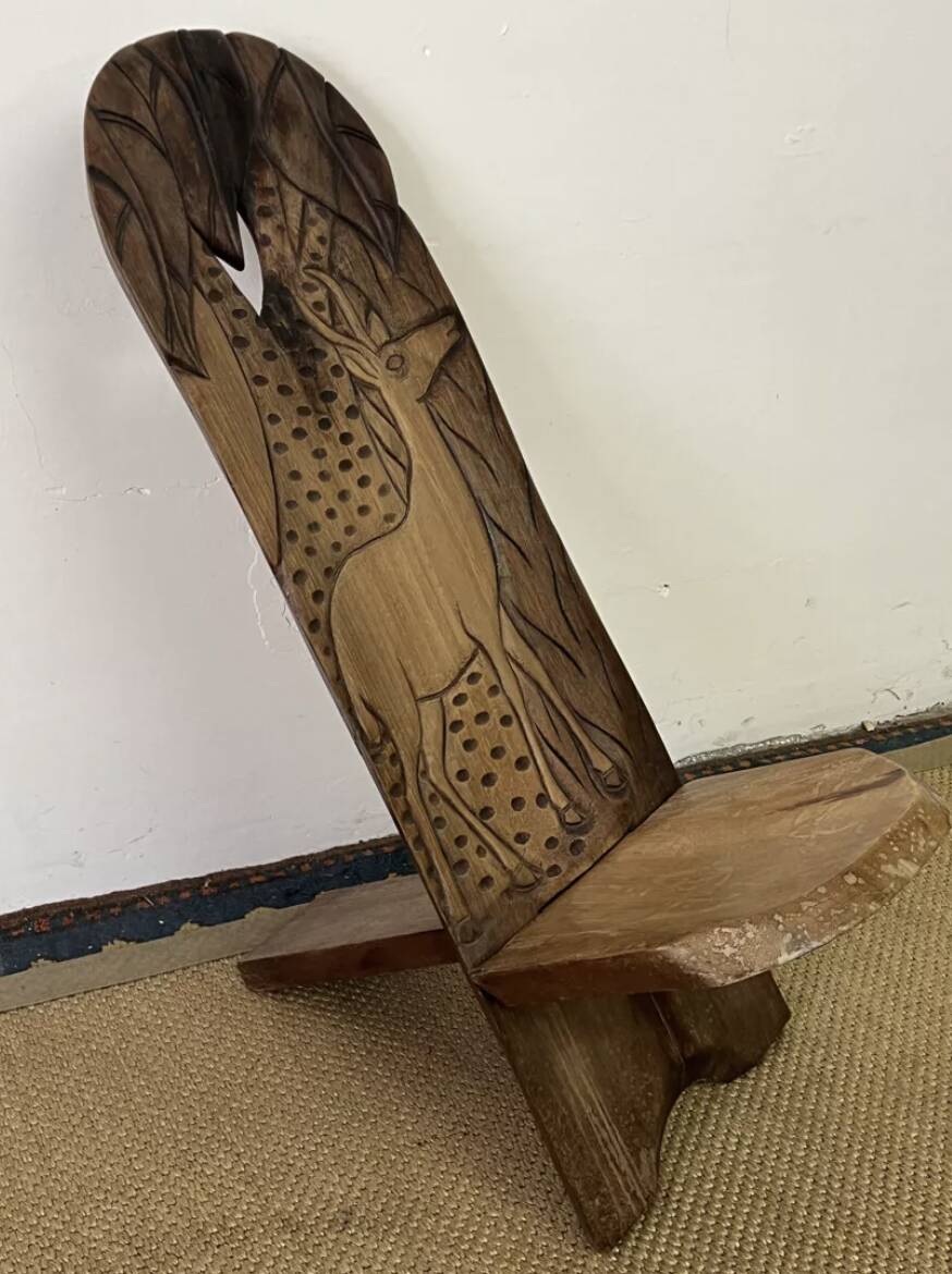 African carved wooden palaver chair