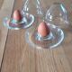 2 egg cups with matching glass cloches in transparent glass