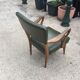 Fauteuil bas  en skaï vert bouteille