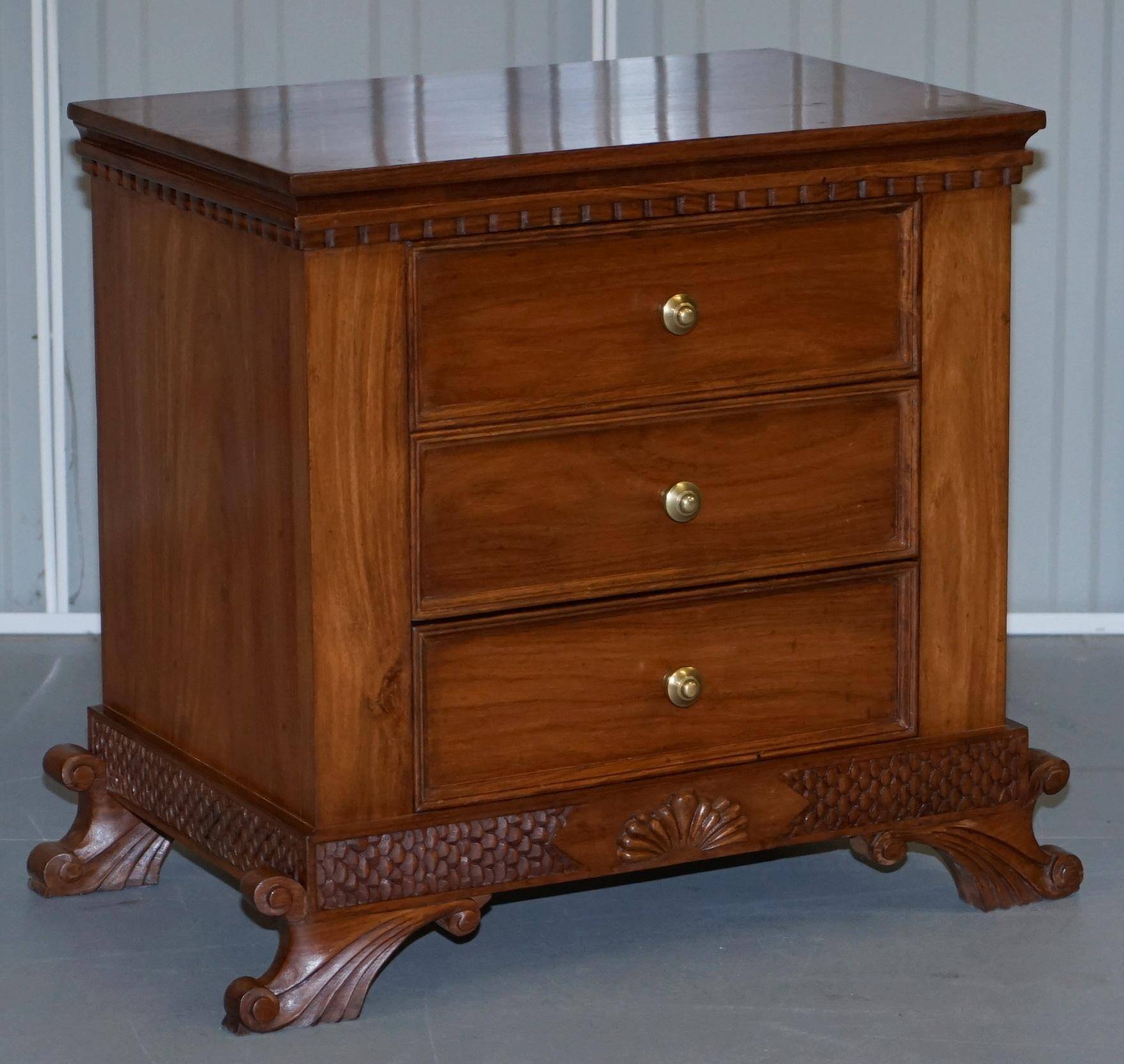 Set of hardwood dressers with finely carved bases.