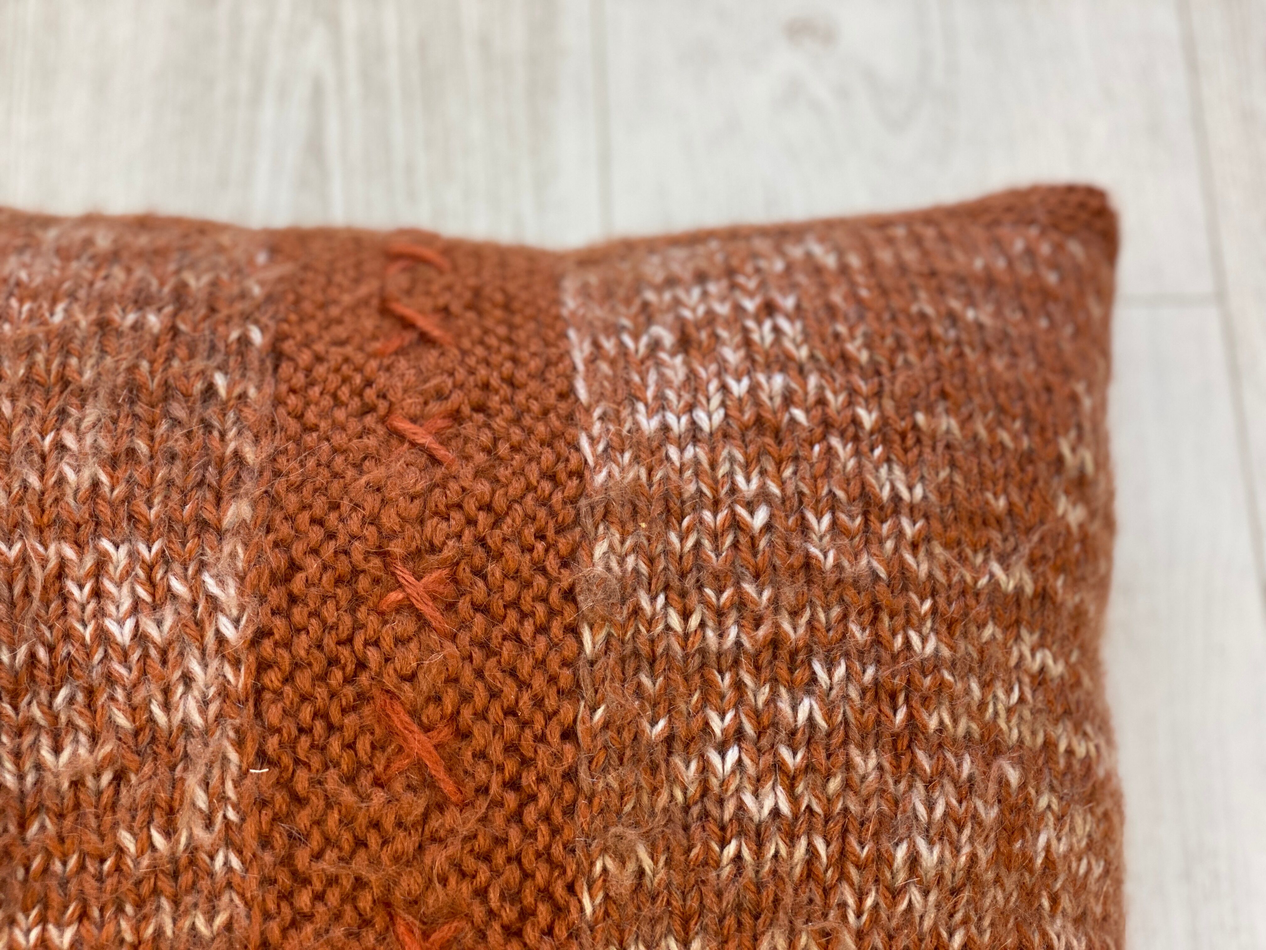 Pair of retro terracotta wool knit cushions