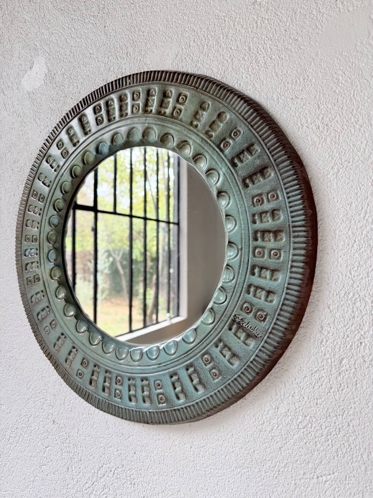 Art mirror Italy in ceramic from the 90s.