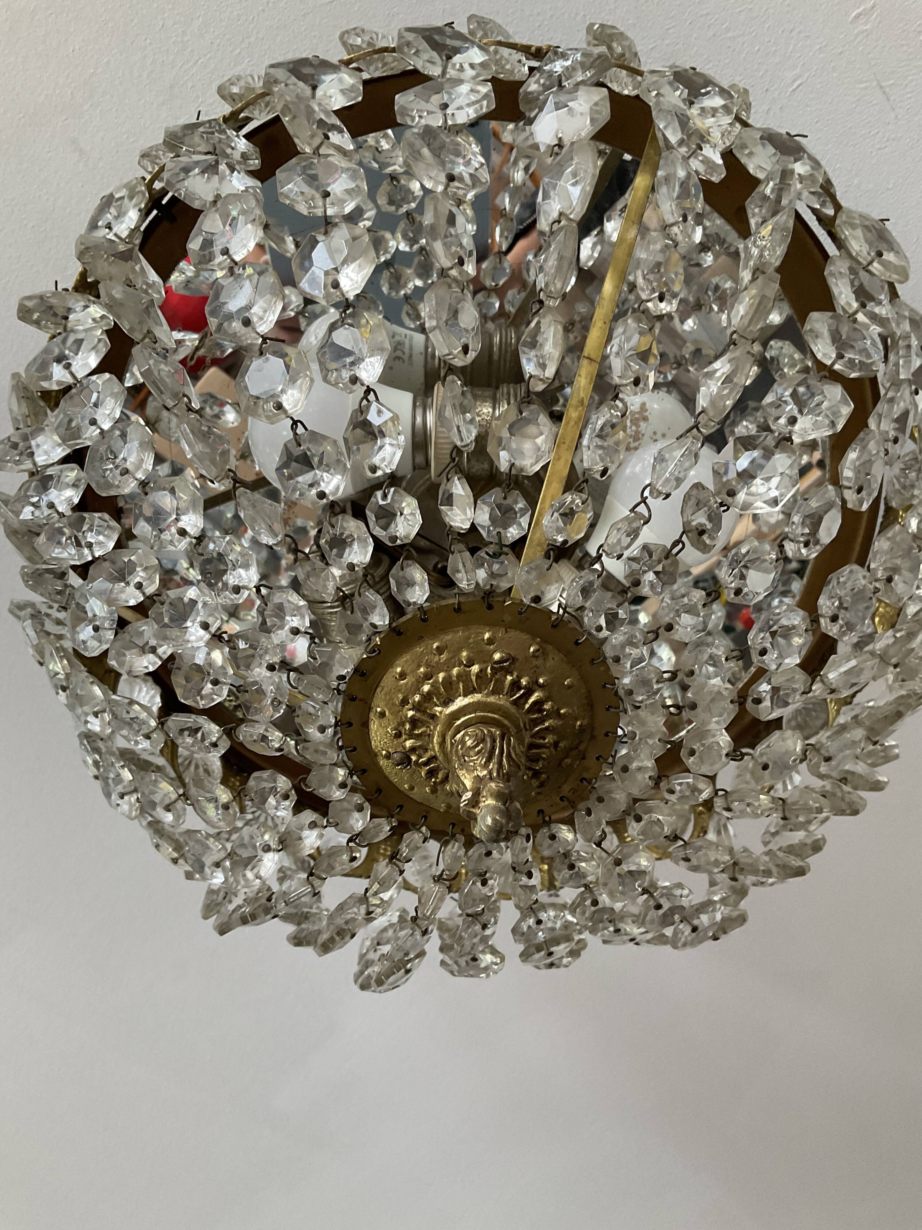 Old ceiling lamp basket in bronze and grapevines