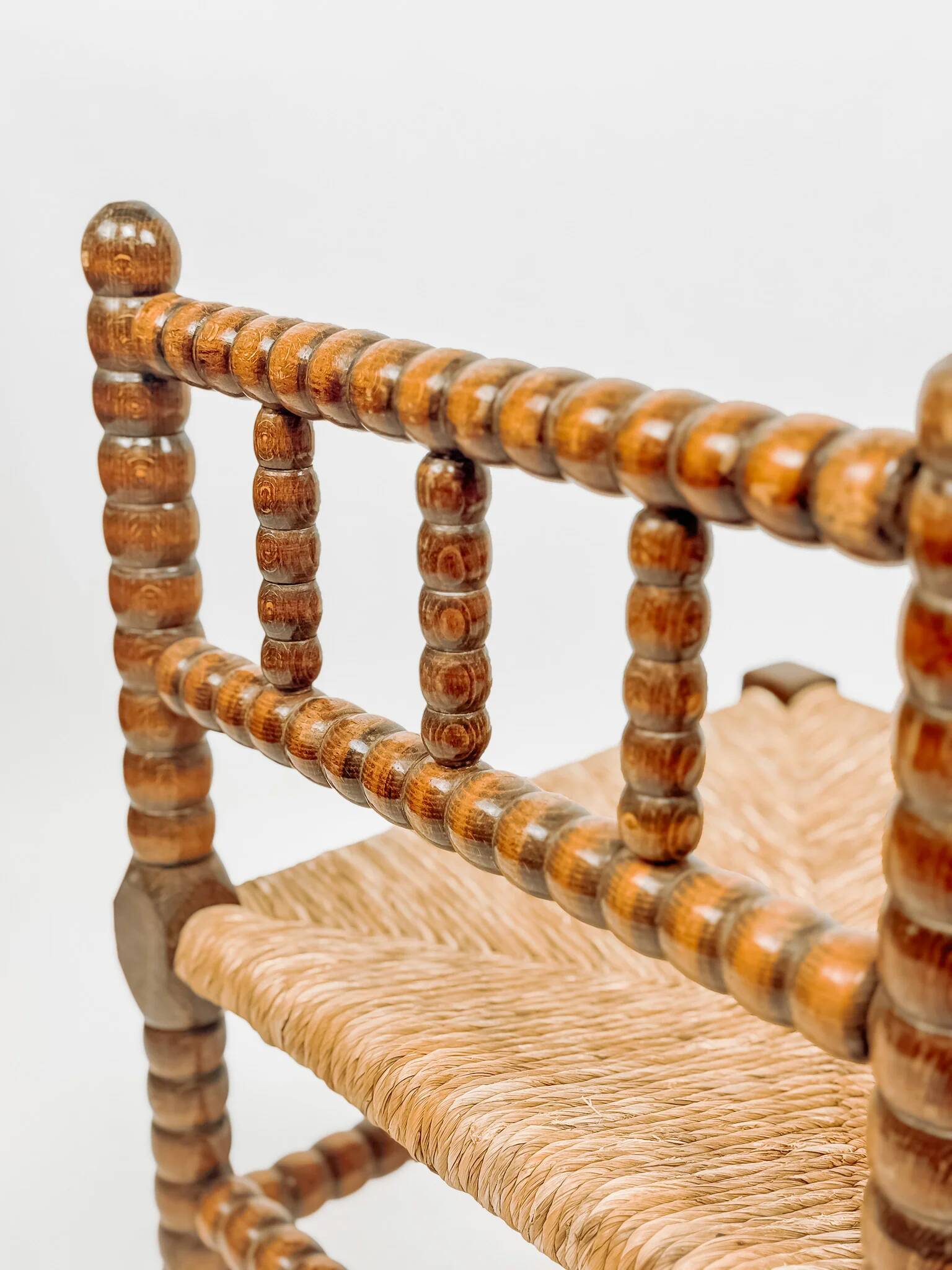 Classic vintage bobbin corner armchair