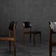 Modern vintage Scandinavian chairs in rosewood and black leather from the mid-century by Bramin, set of 3.