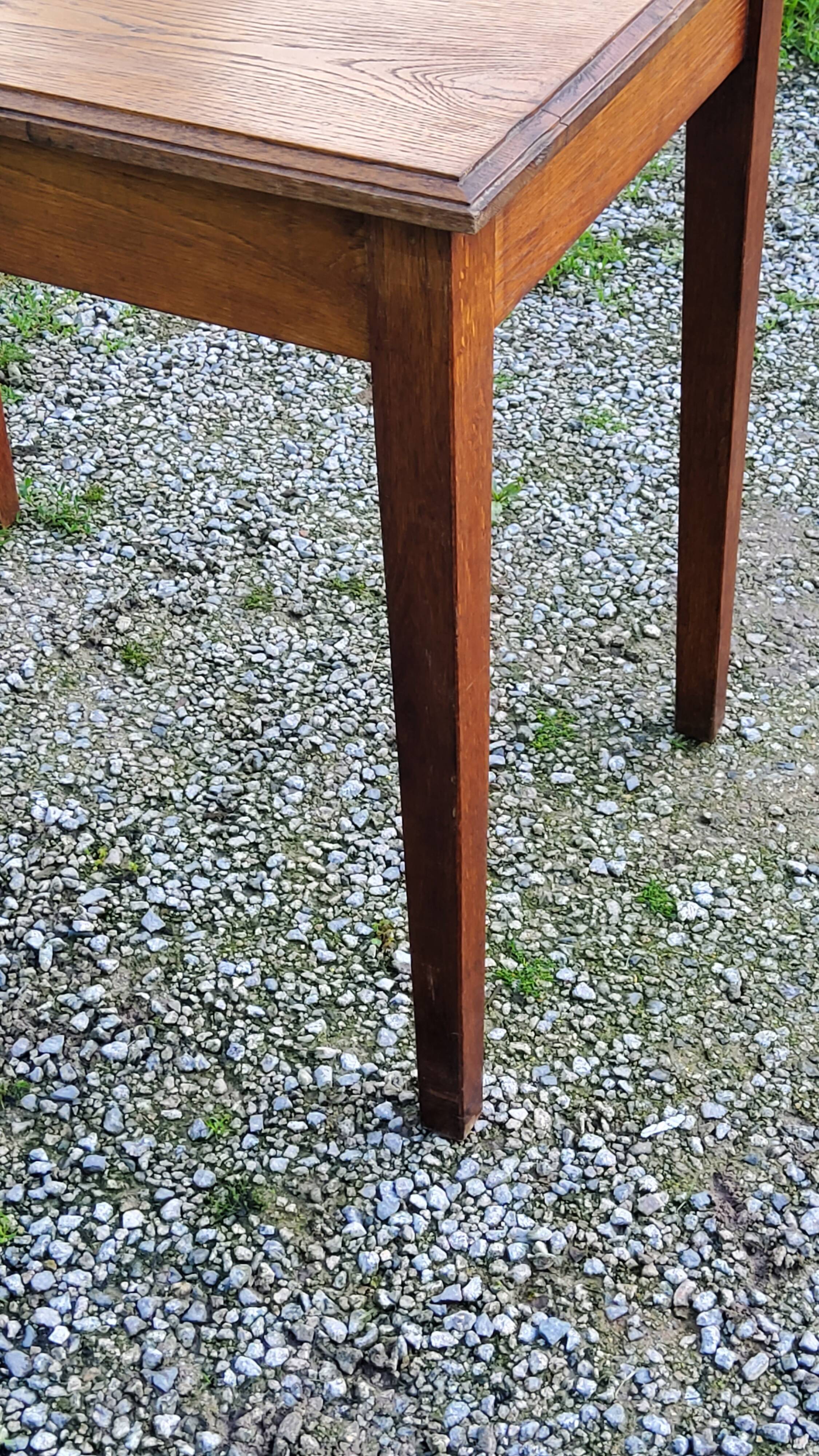 Oak writing table with spindle legs, early 20th century