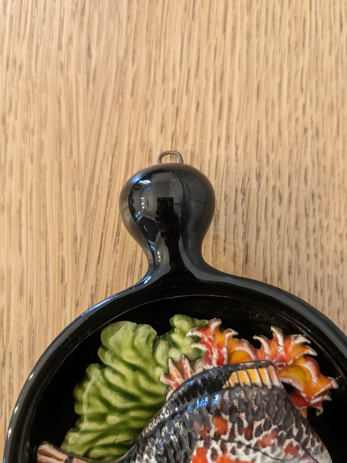 Two trompe l'oeil ceramic casseroles