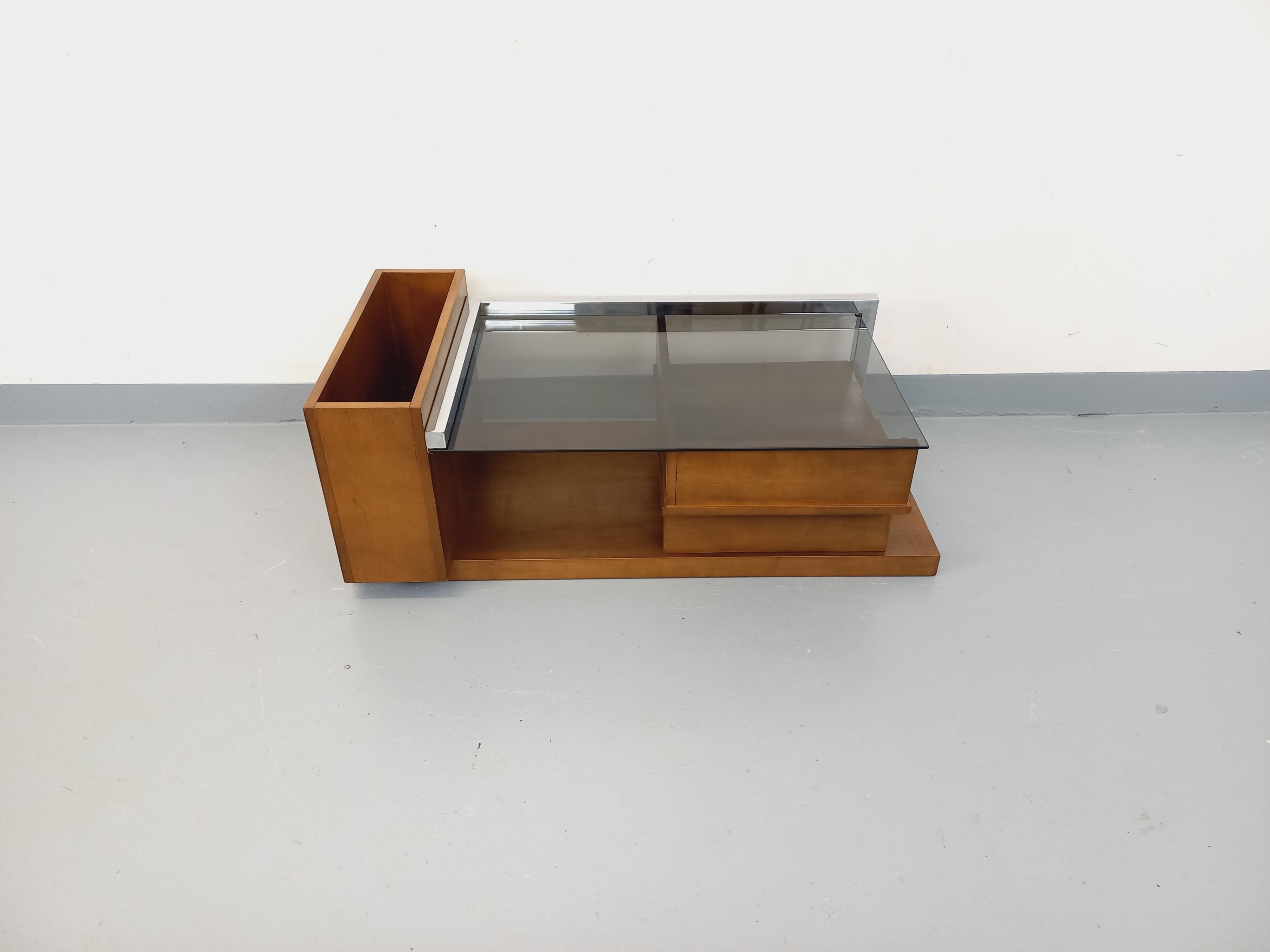 Rectangular vintage modernist coffee table with wooden niches, chrome.